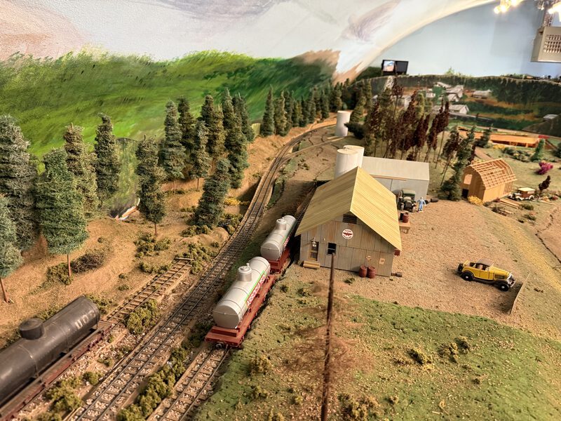 Wide view of the N.C.N.G. layout with town buildings and track
